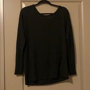 Black tie detail on the back. Long sleeve top